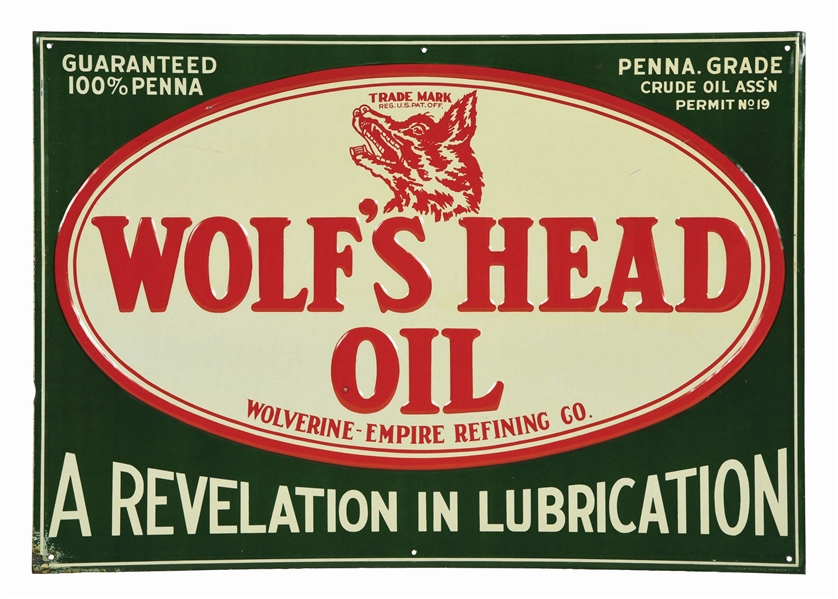 RARE WOLFS HEAD MOTOR OIL EMBOSSED TIN SIGN W/ WOLF GRAPHIC. 