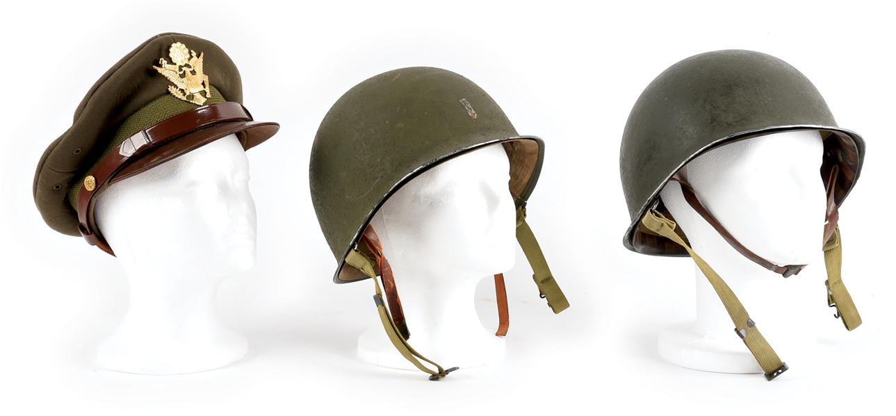 LOT OF 3: TWO US WWII FRONT SEAM FIXED BALE HELMETS AND ONE OFFICERS VISOR HAT