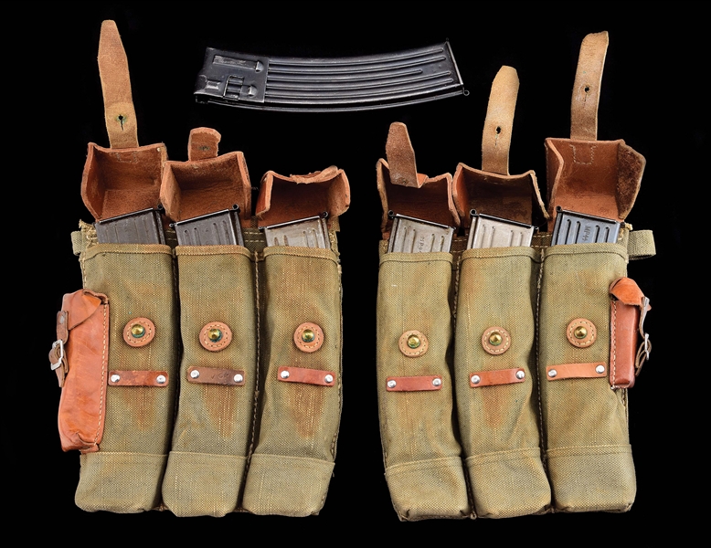 7 MP-44 MAGAZINES WITH CANVAS MAGAZINE POUCH.