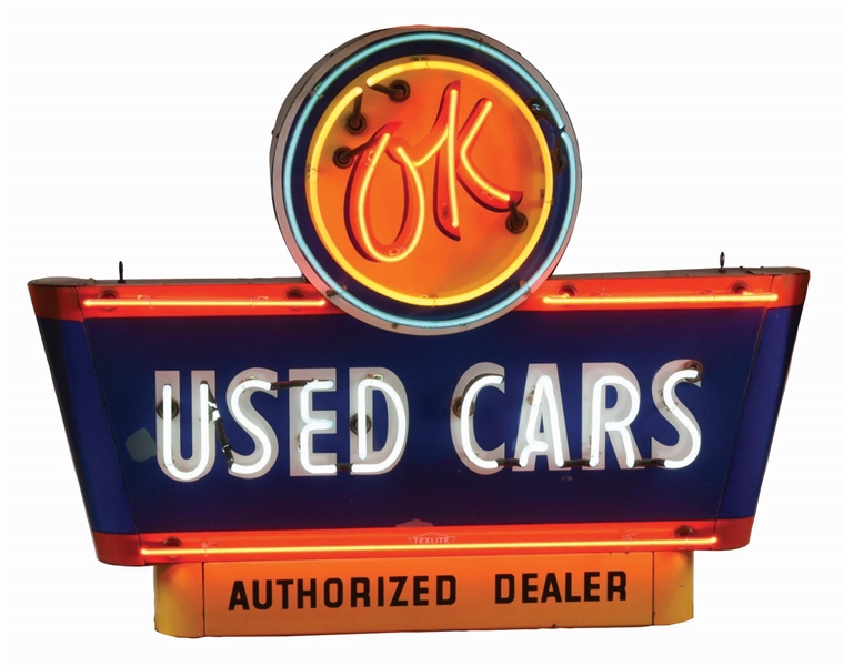 OK USED CARS SINGLE SIDED PORCELAIN NEON SIGN W/ BULLNOSE ATTACHMENTS.