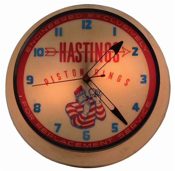 HASTINGS PISTON RINGS DUALITE SERVICE STATION LIGHT UP CLOCK.