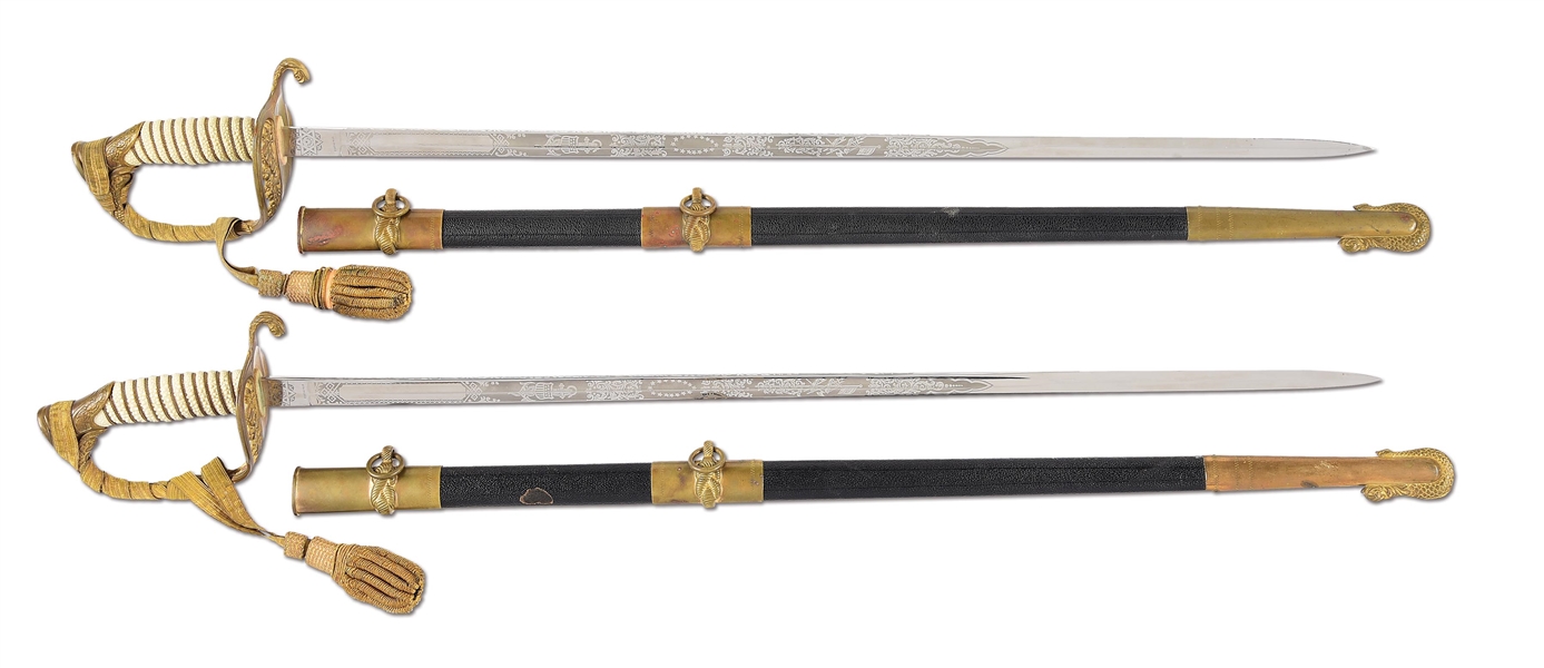 LOT OF TWO 20TH CENTURY MODEL 1852 US NAVY SWORDS.
