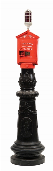THE GAMEWELL COMPANY FIRE ALARM TELEGRAPH STATION FIRE BOX MOUNTED ON CAST PEDESTAL BASE.