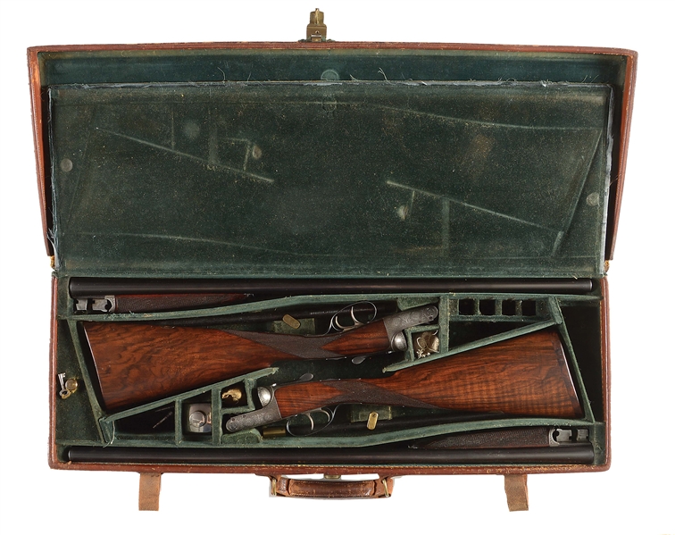 (C) FINE MATCHED PAIR OF JOHN DICKSON ROUND ACTION EJECTOR DOUBLE TRIGGER GAME SHOTGUNS WITH ORIGINAL CASE AND SOME ACCESSORIES.
