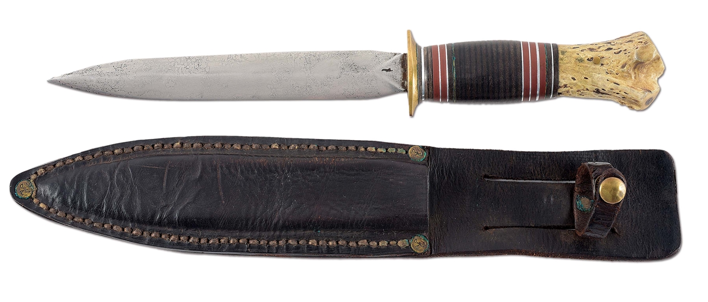 SCARCE EARLY DOUBLE EDGED SCAGEL FIGHTER WITH SCABBARD (1910-1916).