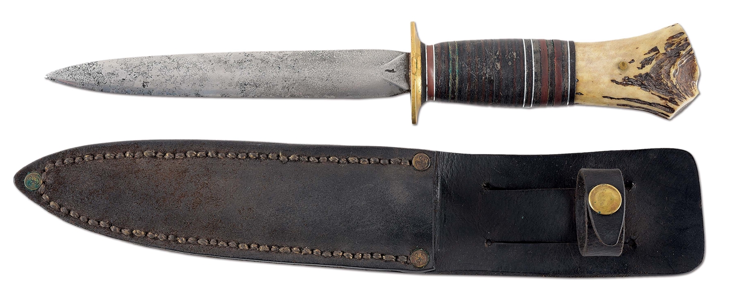 SCAGEL DOUBLE EDGED FIGHTER KNIFE WITH LEATHER SHEATH (1910-1916).