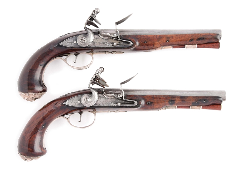 (A) PAIR OF SILVER MOUNTED OFFICERS PISTOLS, POSSIBLY AMERICAN STOCKED.