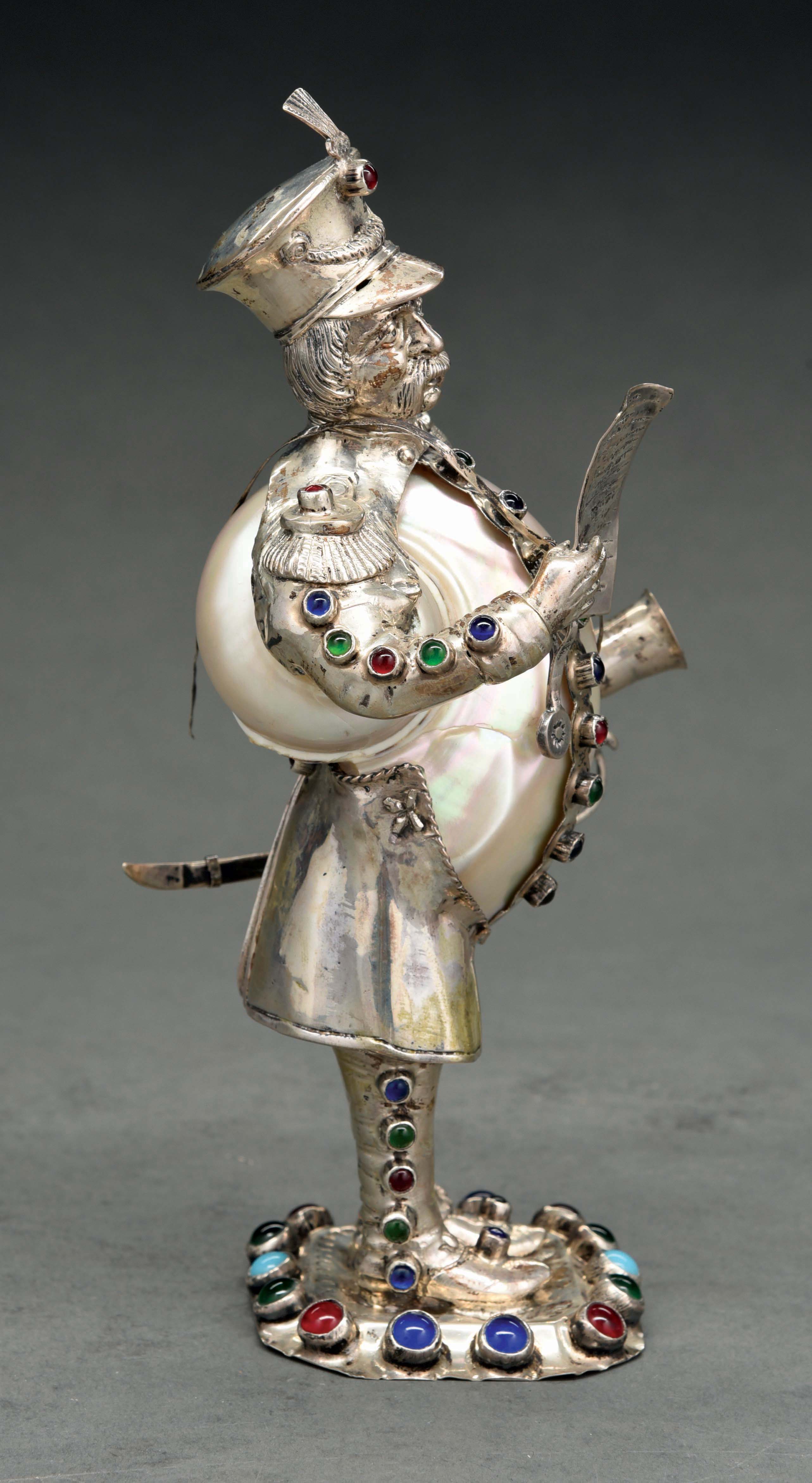 Lot Detail - INLAID SILVER BELL RINGER FIGURE WITH MOTHER OF PEARL.