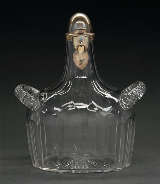 A TIFFANY STERLING MOUNTED DECANTER.