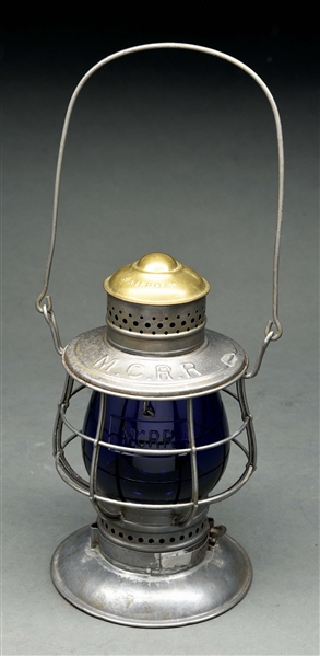 M.C.R.R. NO. 39 C.T. HAM BRASS TOP BELL BOTTOM RAILROAD LANTERN.