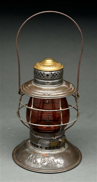 MO. PAC HANDLAN BUCK BRASS TOP BELLBOTTOM RAILROAD LANTERN WITH AMBER EMBOSSED GLOBE.