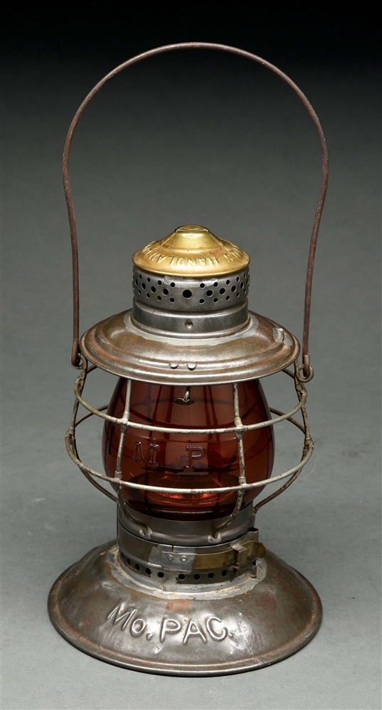 MO. PAC HANDLAN BUCK BRASS TOP BELLBOTTOM RAILROAD LANTERN WITH AMBER EMBOSSED GLOBE.