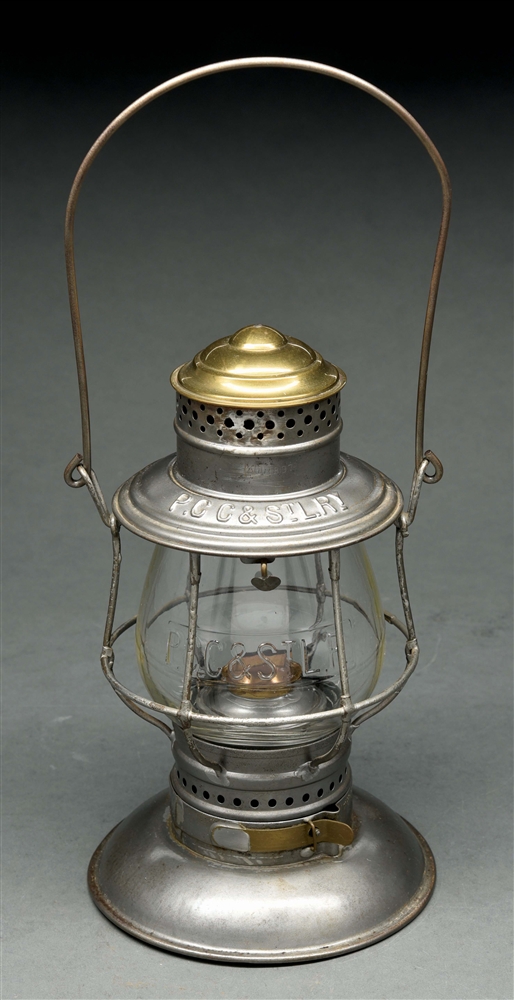 P. C C & STL. RY ADAMS AND WESTLAKE BRASS TOP BELLBOTTOM RAILROAD LANTERN.