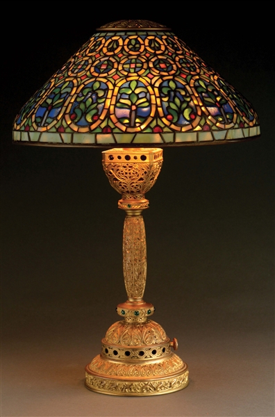 TIFFANY STUDIOS VENETIAN LEADED GLASS TABLE LAMP WITH GILT BRONZE BASE.