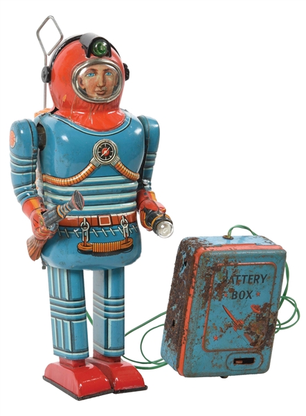 JAPANESE TIN LITHO BATTERY-OPERATED REMOTE-CONTROLLED ASTRONAUT TOY.