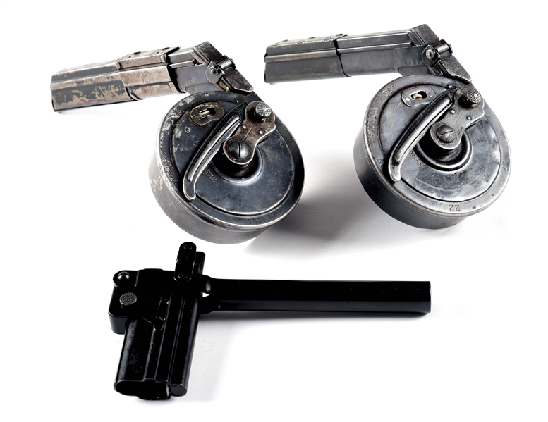 LOT OF 3: TWO P.08 SNAIL DRUM MAGAZINES, ONE WITH MP-18 ADAPTER & ONE REPRODUCTION SNAIL DRUM LOADER.