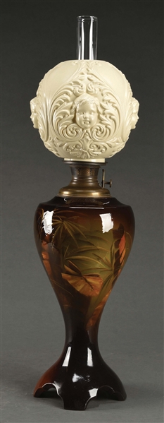 LARGE WELLER OIL LAMP WITH GLOBE IN RELIEF.
