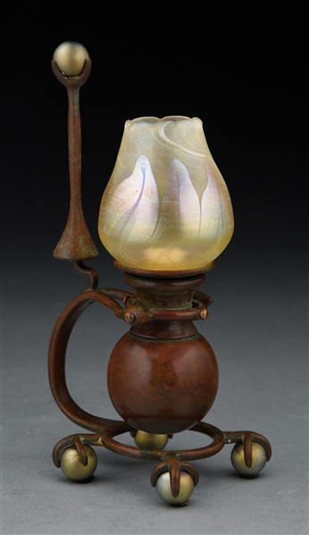 TIFFANY STUDIOS GIMBLE CANDLESTICK WITH FAVRILE SHADE.
