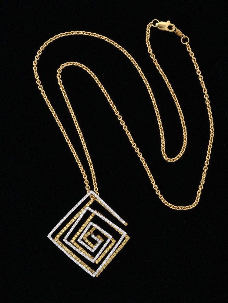 18K TWO-TONE WHITE AND GOLD PENDANT.