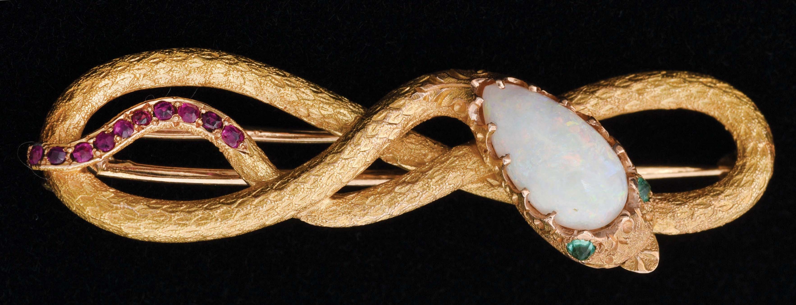 GOLD AND OPAL SNAKE BROOCH.