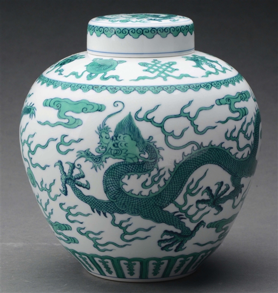 CHINESE GREEN GLAZE DRAGON JAR WITH LID.