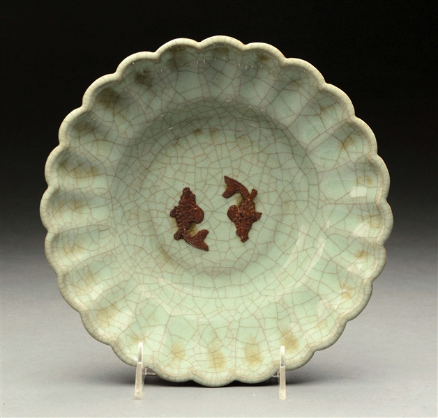 SCALLOPED DEEP CELADON BOWL WITH GADROONED SIDES.