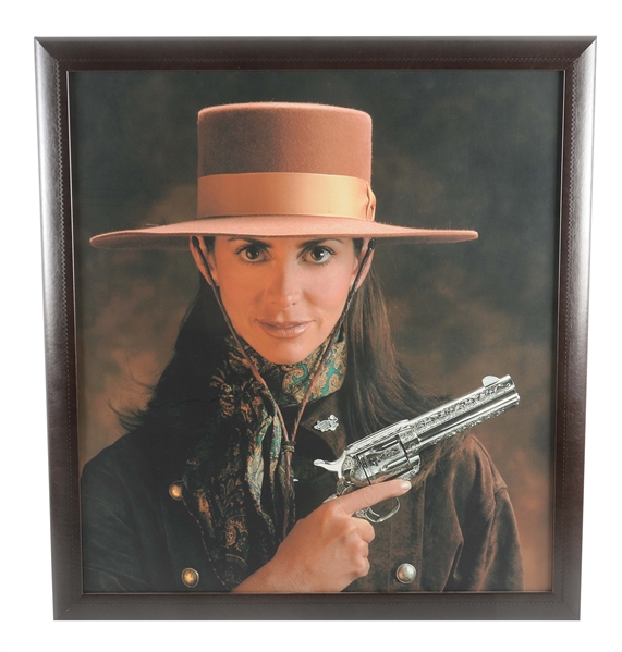 FRAMED PICTURE OF 2001 AMERICAN WESTERN ARMS WORLD CHAMPION ANNIE ELLETT.