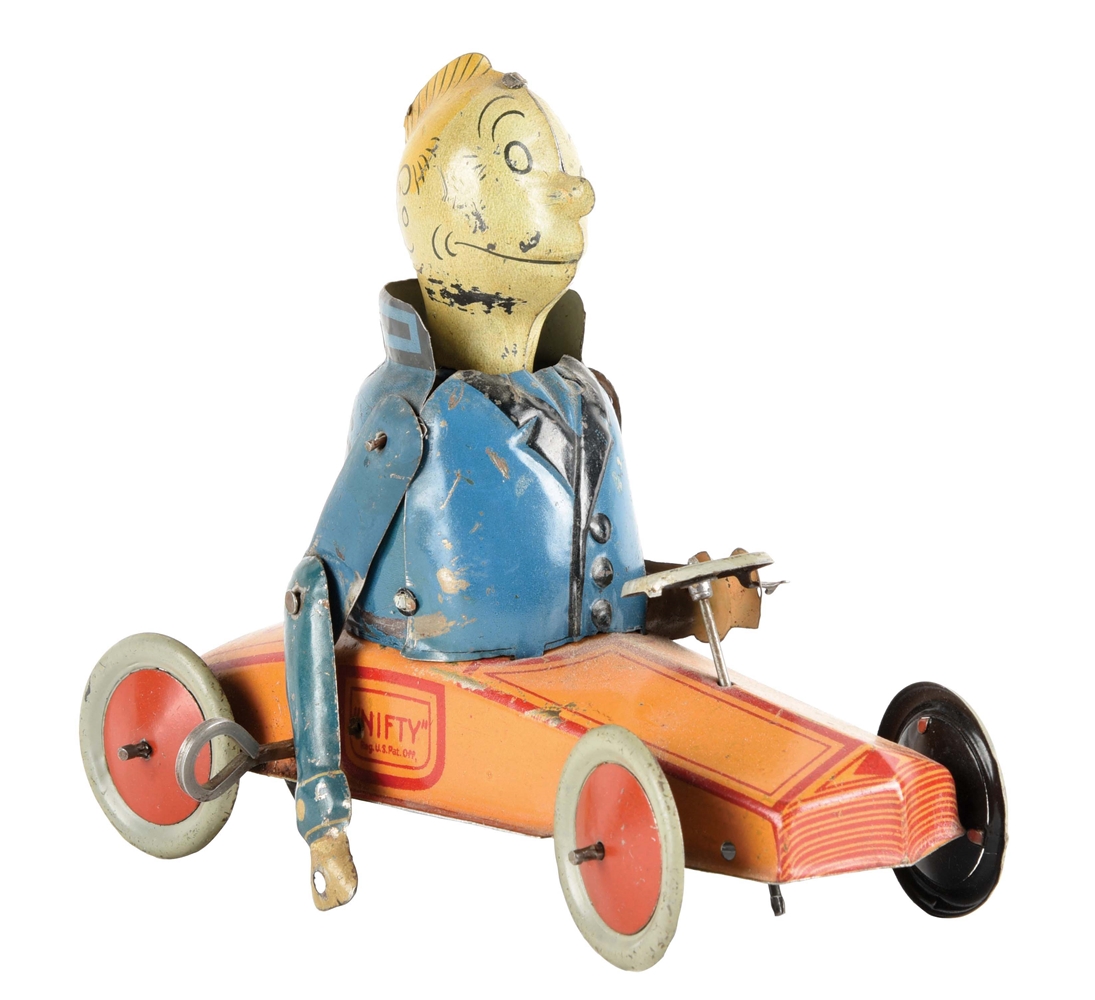 GERMAN TIN LITHO WIND-UP NIFTY JIGGS IN HIS JAZZCAR.