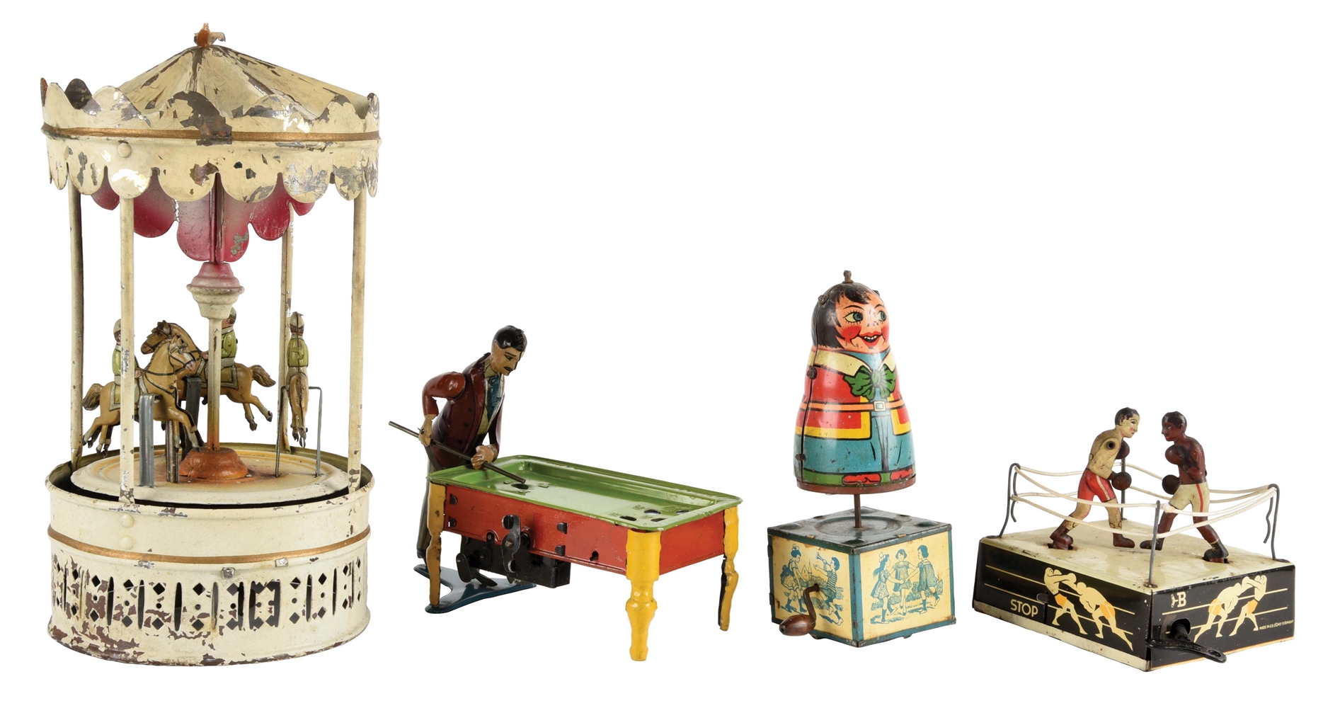LOT OF 4: GERMAN LITHOGRAPHED AND HAND-PAINTED TOYS.