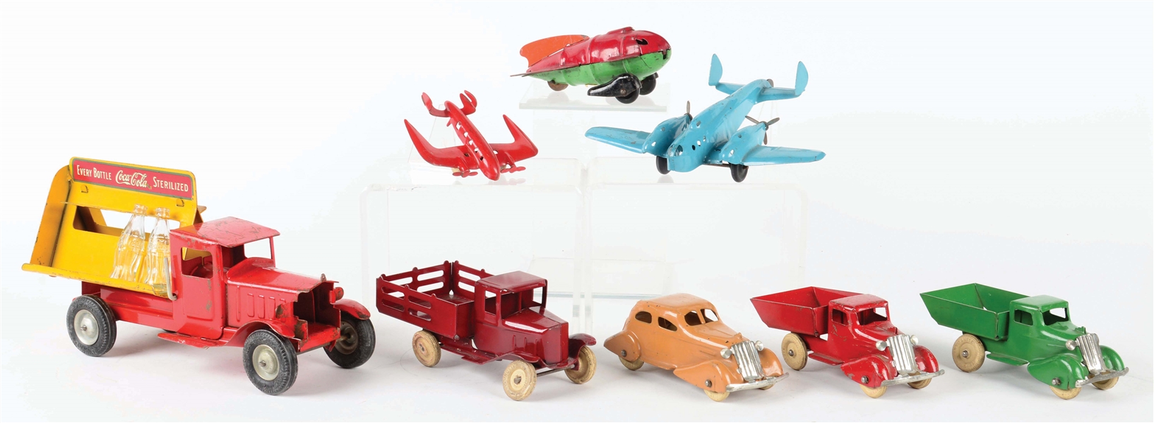 LOT OF 8: EARLY AMERICAN MADE PRESSED STEEL VEHICLE TOYS.