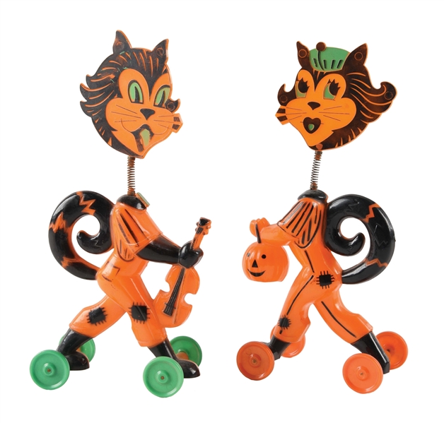 TWO HALLOWEEN SPRINGY HEAD CATS ON WHEELS.
