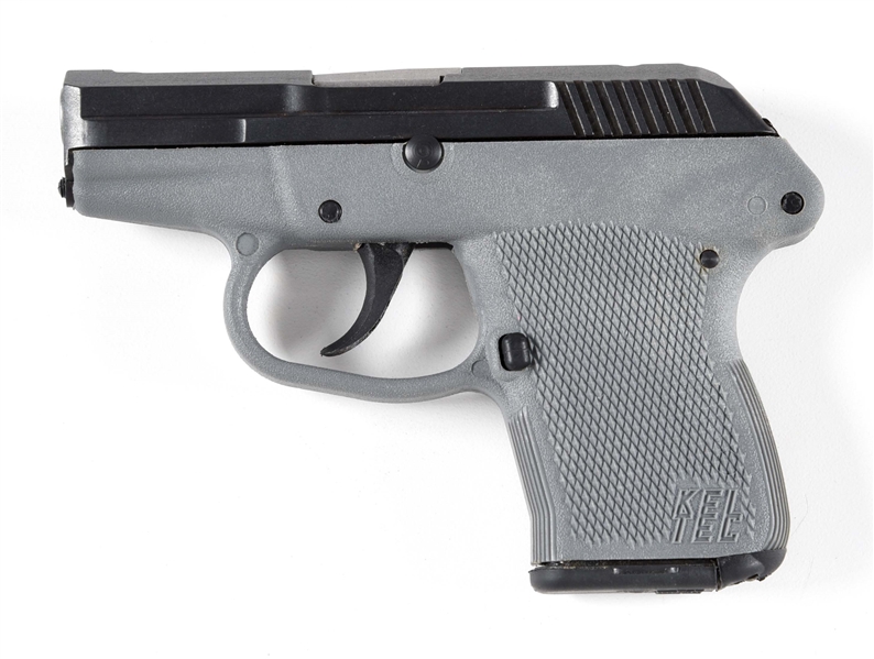 (M) KELTEC P-32 SEMI-AUTOMATIC PISTOL WITH NON-MATCHING BOX AND TWO FACTORY SOFT CASES. 