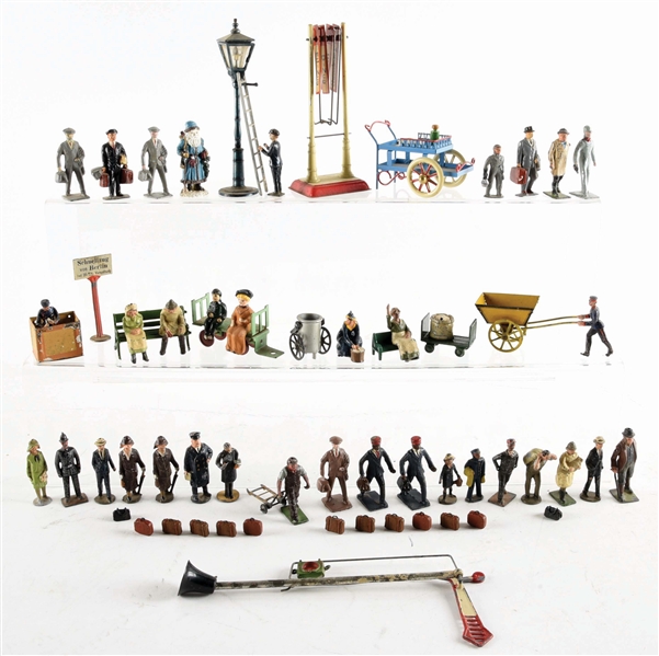 BOX LOT OF EARLY EUROPEAN TRAIN ACCESSORIES AND LEAD FIGURES.