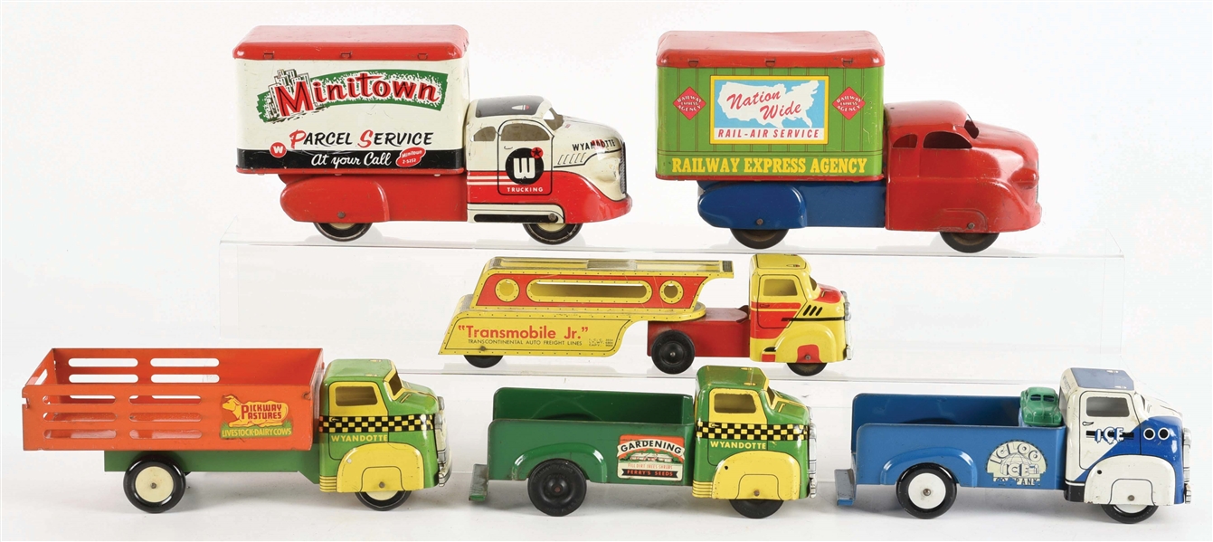 LOT OF 6: VARIOUS PRESSED STEEL AND TIN LITHO WYANDOTTE TRUCKS.