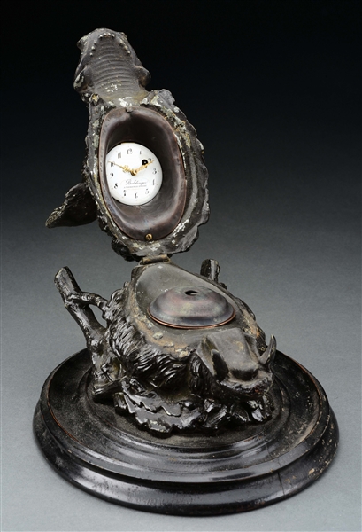 INK STAND WITH BOARS HEAD CLOCK.