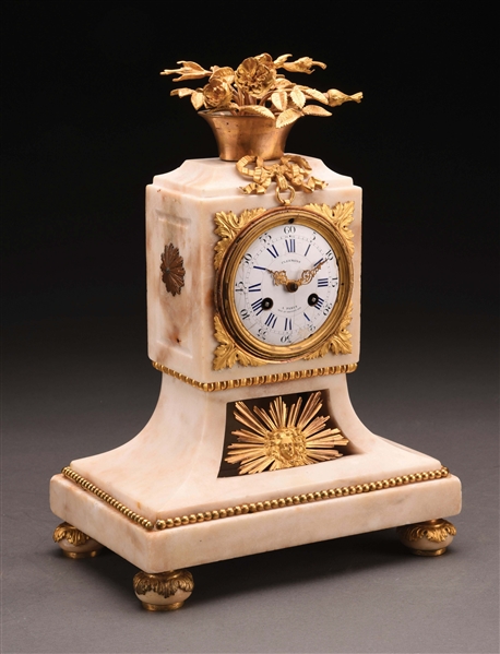 ORMOLU MOUNTED MARBLE FRENCH CLOCK.