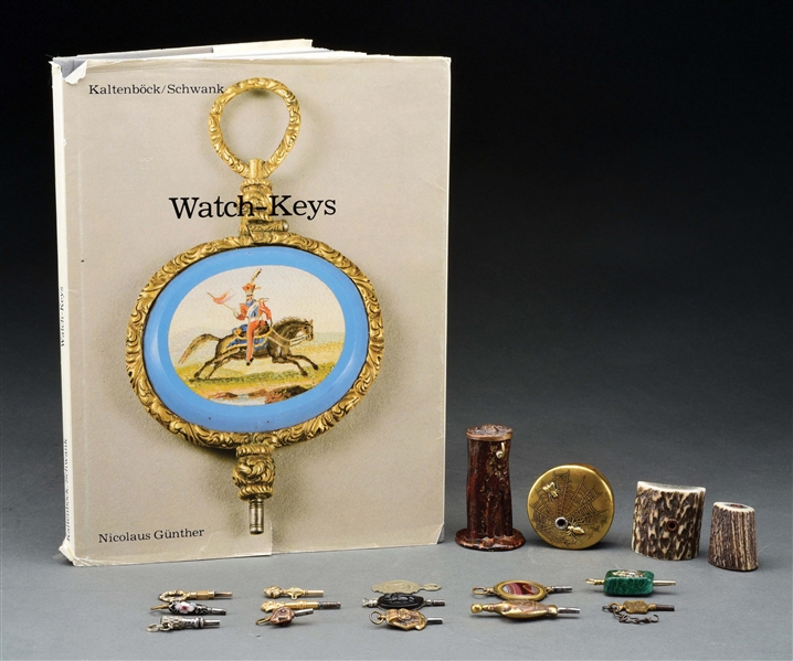 WATCH KEY COLLECTION WITH RARE BOOK.