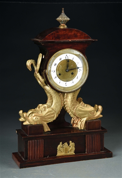 AUSTRIAN NEOCLASSICAL CASED CLOCK WITH DOLPHINS.