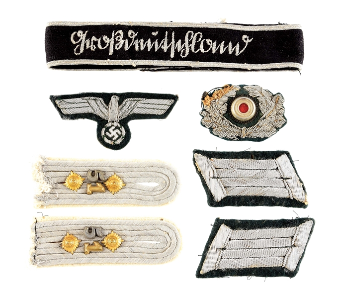 LOT OF 5: GERMAN WWII GROSSDEUTSCHLAND CUFF TITLE AND OFFICER INSIGNIA