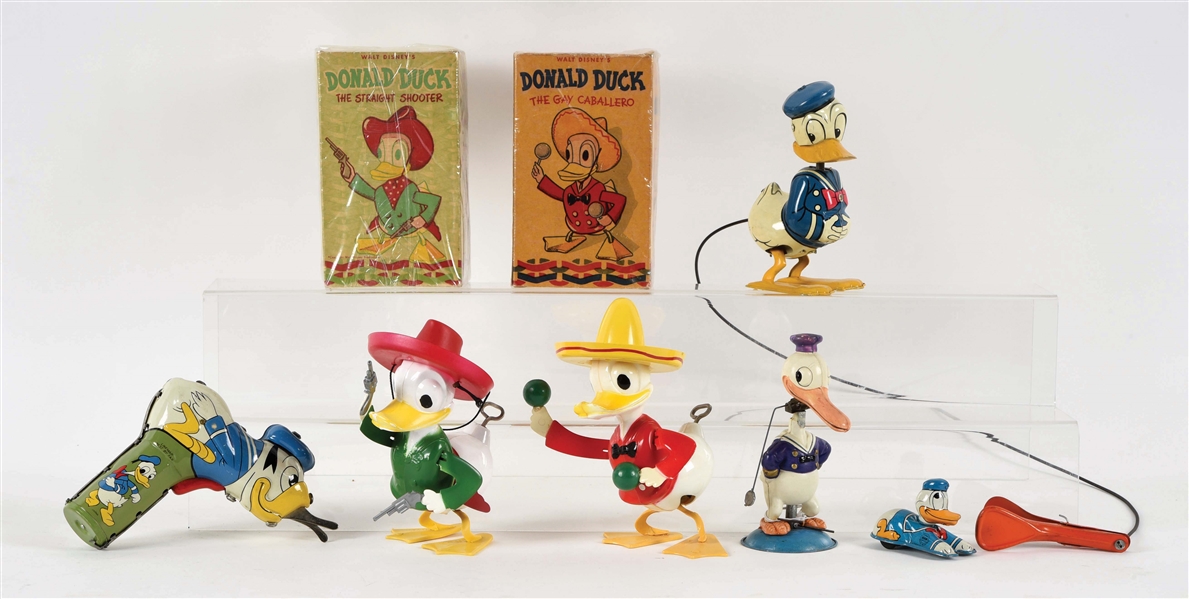 LOT OF 6: VARIOUS CELLULOID, PLASTIC AND TIN LITHO DONALD DUCK TOYS.