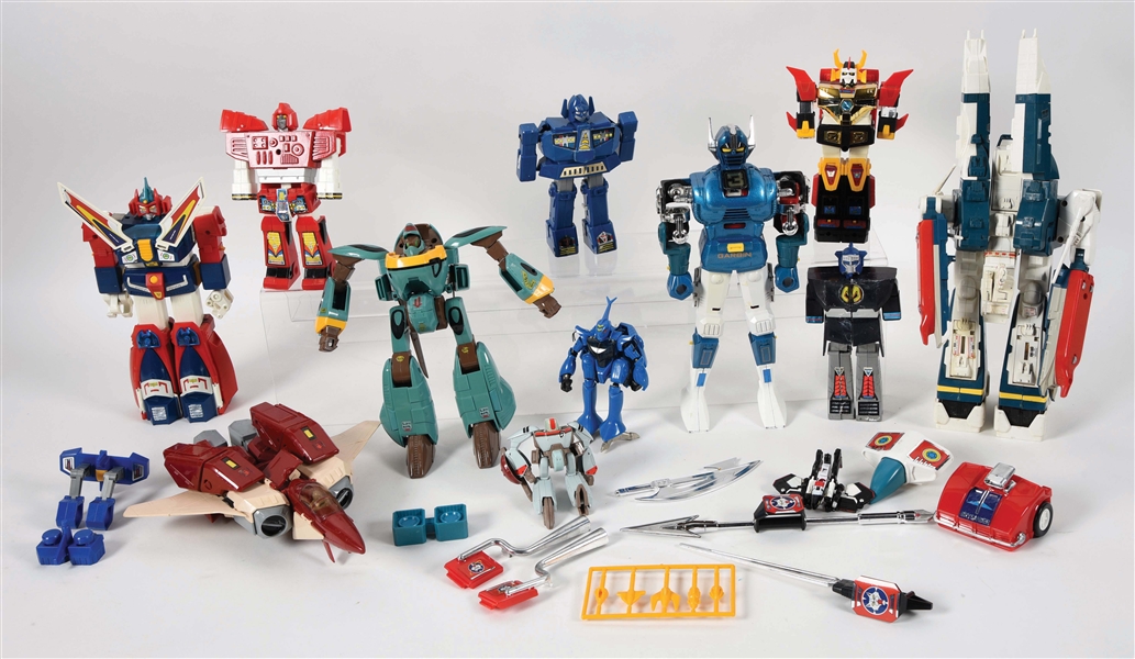 LOT OF APPROXIMATELY 10 VARIOUS JAPANESE AND OTHER MANUFACTURERS TRANSFORMER ROBOTS AND VEHICLES.