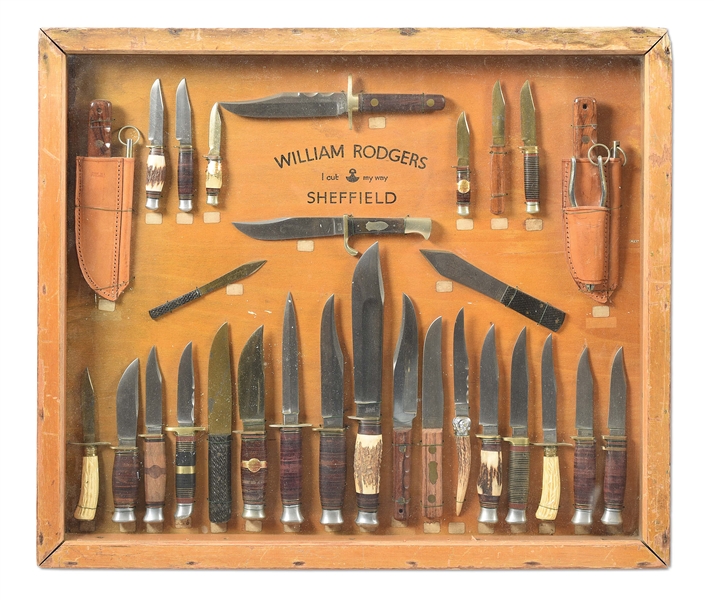 WALL KNIFE DISPLAY CASE WITH 29 VINTAGE FIXED BLADE KNIVES.