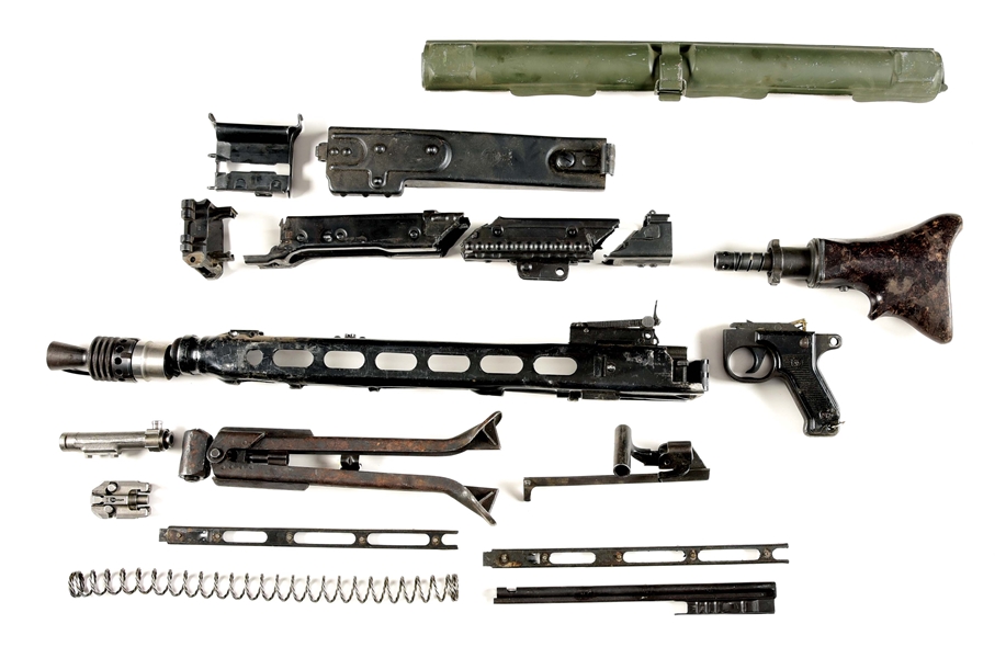 MG-42 MACHINE GUN PARTS KIT WITH CONBINATION SAW CUT AND TORCH CUT RECEIVER PIECES.