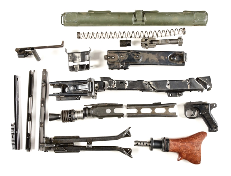 MG-42 MACHINE GUN PARTS KIT WITH TASTEFULLY CUT RECEIVER PIECES.