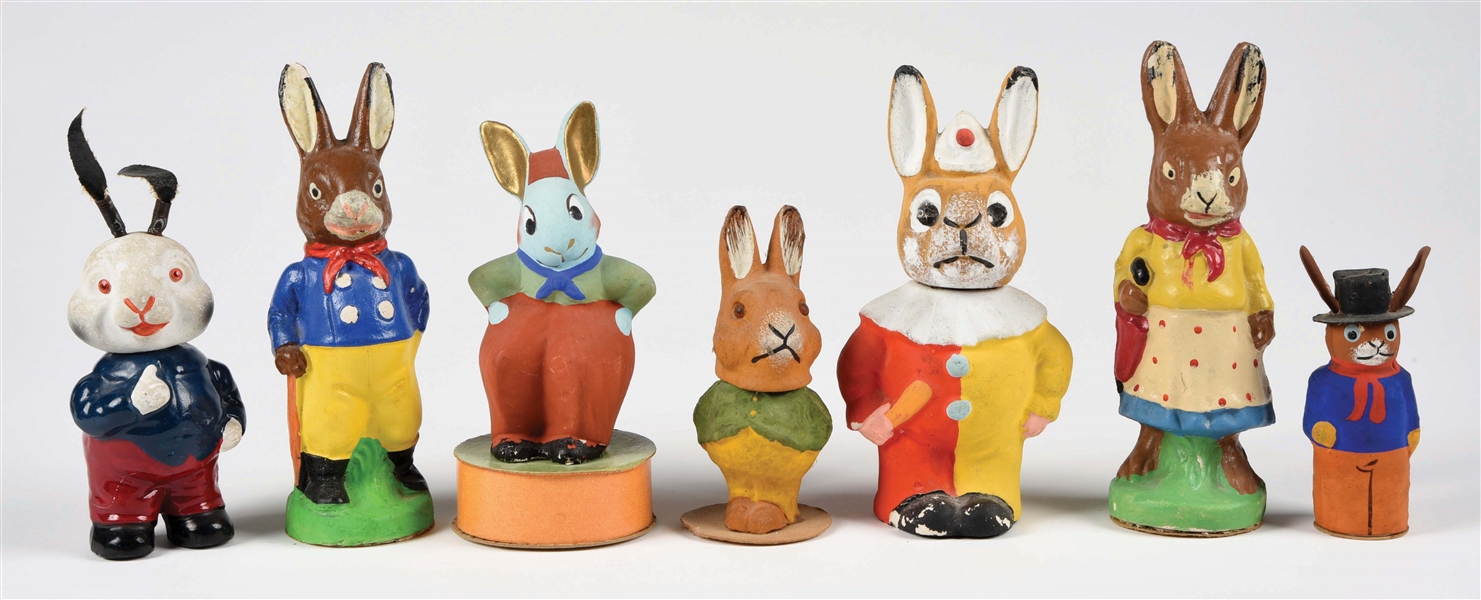LOT OF 7: BUNNY RABBIT CANDY CONTAINERS AND FIGURES.
