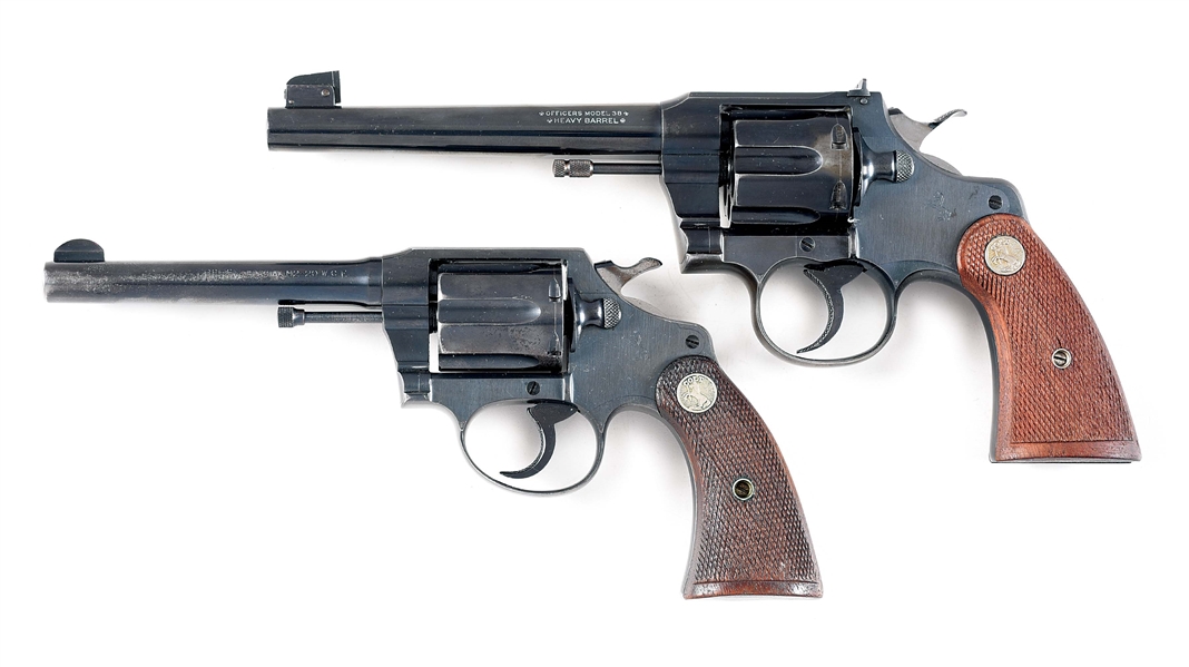 (C) LOT OF 2: COLT OFFICERS MODEL HEAVY BARREL AND POLICE POSITIVE REVOLVERS.