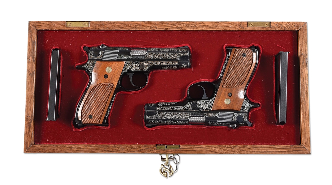 (M) LOT OF 2: CASED PAIR OF SMITH AND WESSON 39-2 9MM SEMI-AUTOMATIC PISTOLS WITH ORIGINAL FACTORY BOXES.