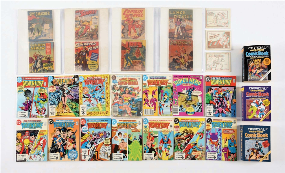 LOT OF 26: VARIOUS ADVENTURE, MIDGET AND OVERSTREET COMIC BOOKS AND PRICE GUIDES.