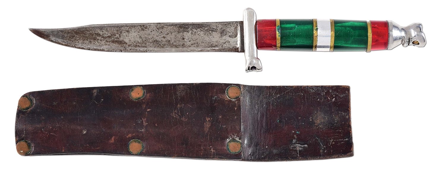WORLD WAR II THEATRE KNIFE WITH SKULL DECORATION ON GUARD AND POMMEL, CIRCA 1941-1945.