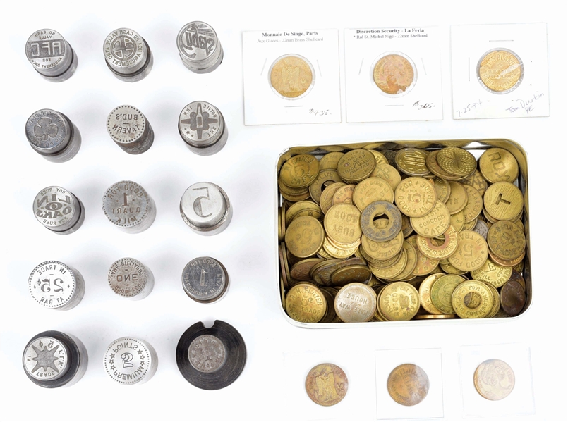 LARGE LOT OF COIN OPERATED MACHINE TOKENS AND TOKEN STAMPS.